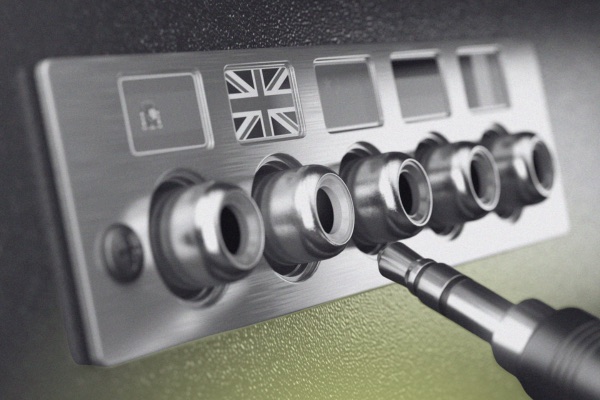 multiple headphone jacks with different countries' flags above each one